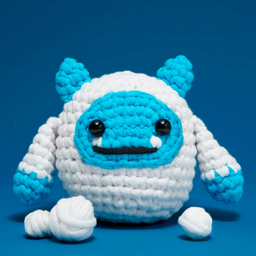 Crocheted blue and white yeti
